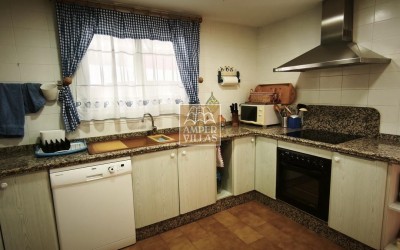 Spacious bungalow with a communal swimming pool and tennis court next to the golf club.